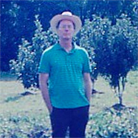 Ray, in an orchard
