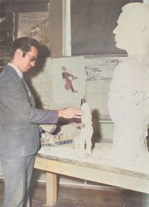 Ray, teaching art at Junction City High School